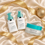 PEVONIA Sensitive Skin Gift Box arranged in a festive flatlay. File: pevonia-sensitive-skin-gift-box-christmas-flatlay-2026.jpg