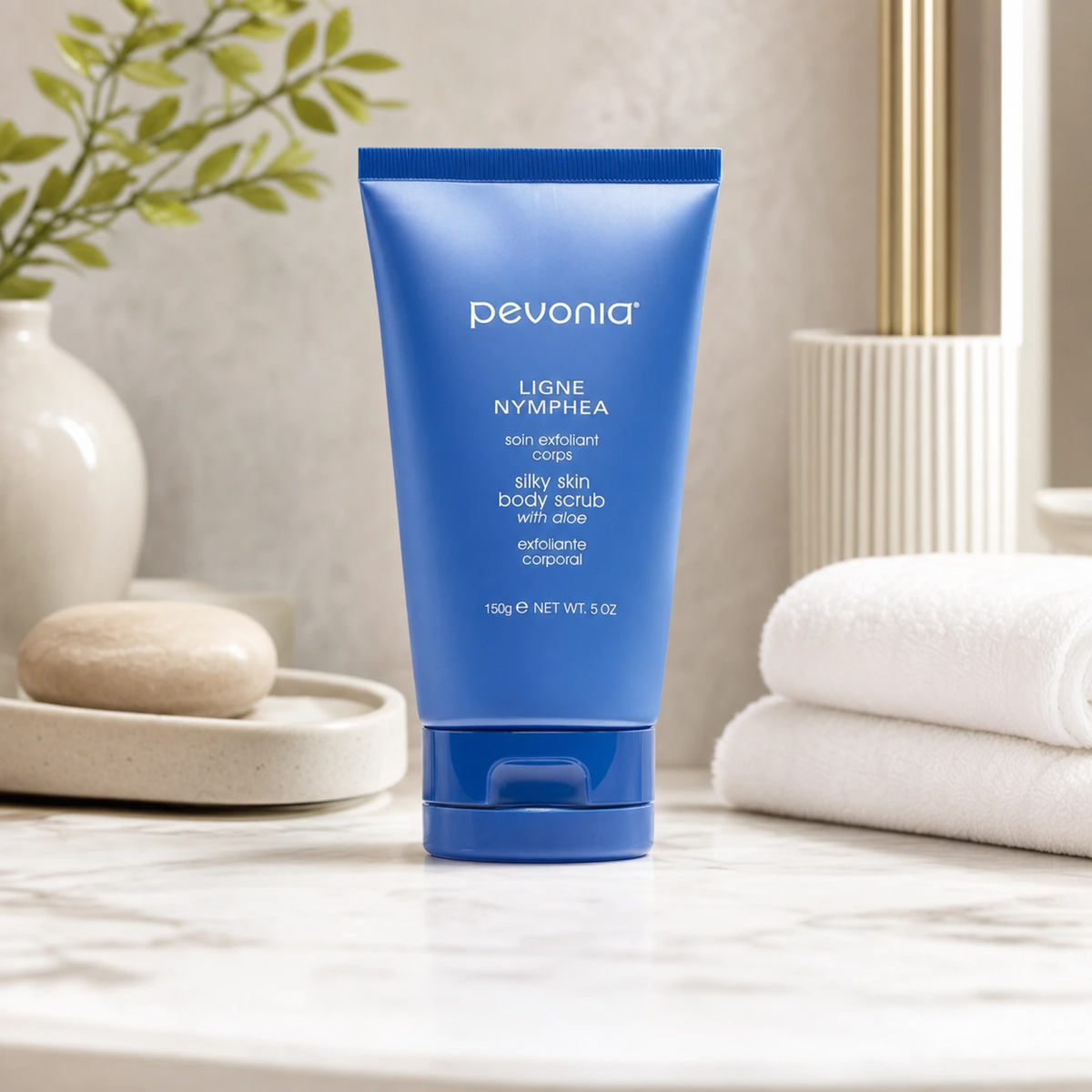 Pevonia Silky Skin Body Scrub 150g on a luxury bathroom vanity for smoother, softer and brighter body skin
