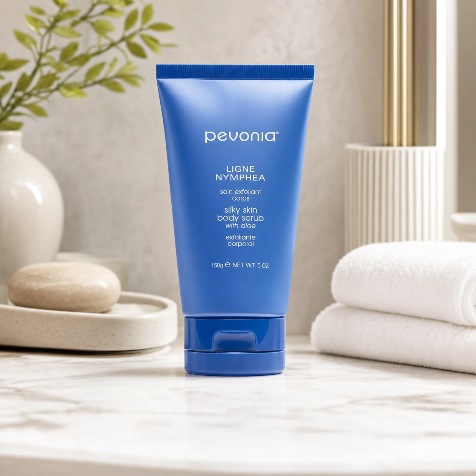 Pevonia Silky Skin Body Scrub 150g on a luxury bathroom vanity for smoother, softer and brighter body skin
