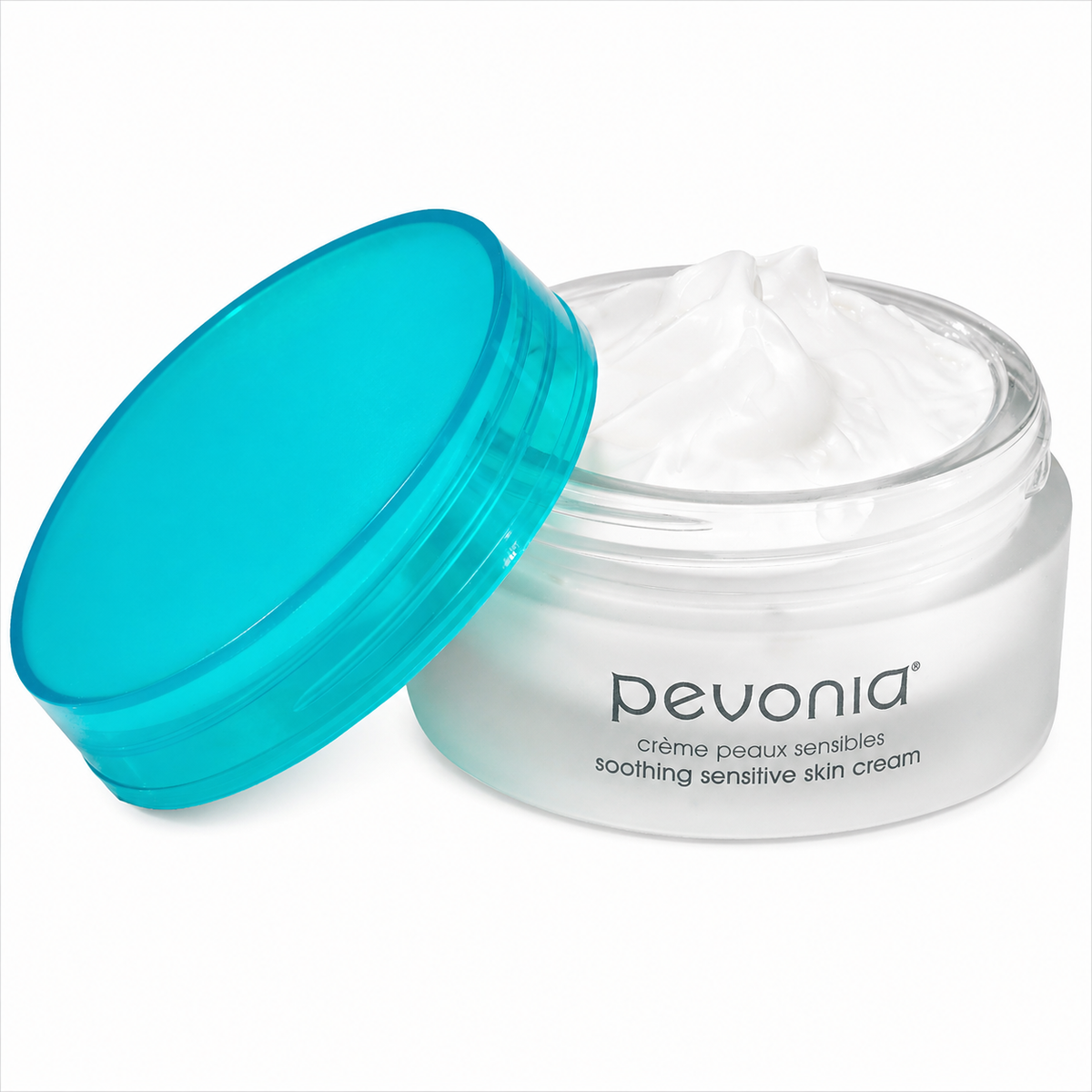 Pevonia Soothing Sensitive Skin Cream 50g open jar showing product texture with turquoise lid beside container