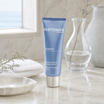 Phytomer Acnipur Blemish Solution Fluid 50ml on a marble bathroom vanity with glass vessel, botanical, white towels and ceramic dish, premium at-home skincare setting