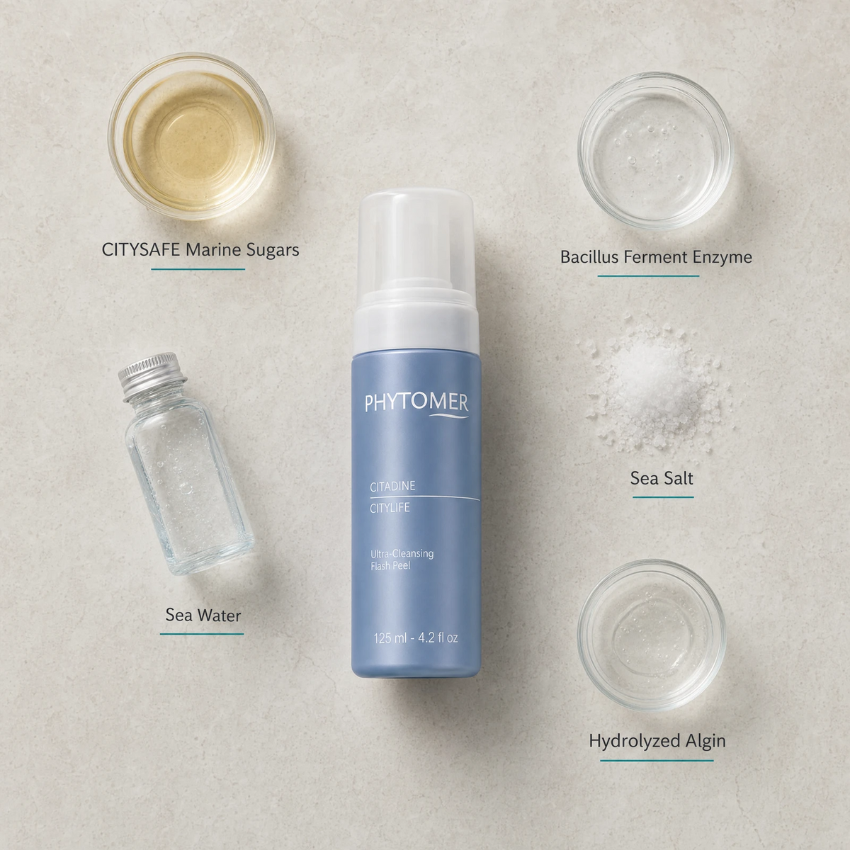 Phytomer Citylife Ultra-Cleansing Flash Peel 125ml flatlay on limestone surface with CITYSAFE Marine Sugars, Bacillus Ferment Enzyme, Sea Water, Sea Salt, and Hydrolyzed Algin