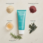 Phytomer Cyfolia Organic Radiance Exfoliating Cream 50ml flatlay on limestone surface with Argan Kernel Powder, Pomegranate Seed Powder, Orange Water, Cyfolia Algae, and Rosemary Extract