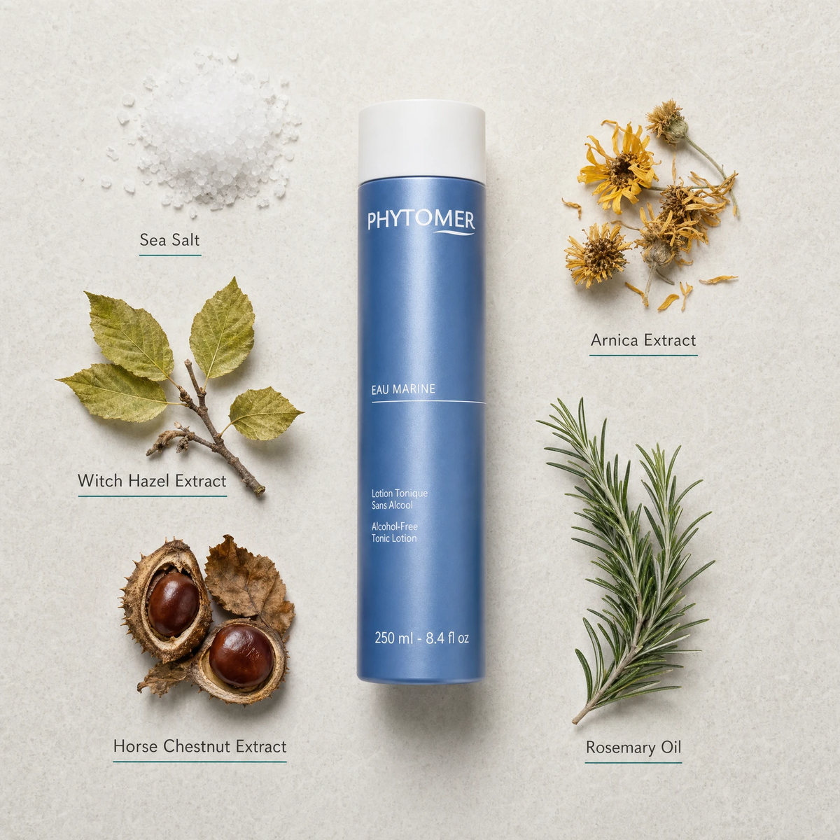 Phytomer Eau Marine Alcohol-Free Tonic Lotion 250ml flatlay on limestone surface with Sea Salt, Witch Hazel Extract, Horse Chestnut Extract, Arnica Extract, and Rosemary Oil