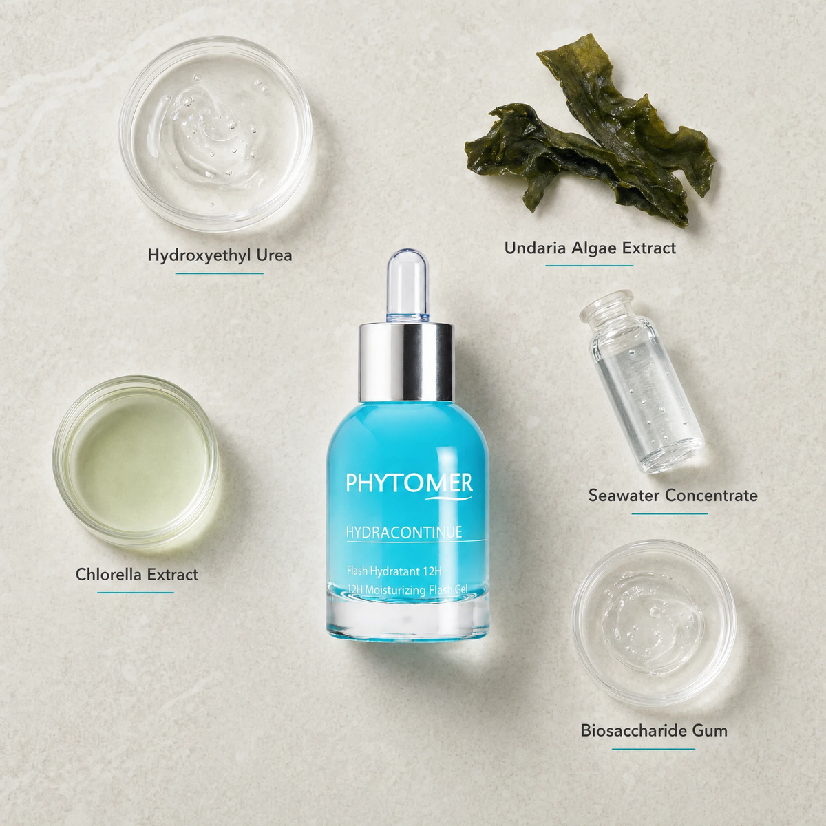 Phytomer Hydra Continue 12H Moisturizing Flash Gel 30ml flatlay on limestone surface with Hydroxyethyl Urea, Undaria Algae Extract, Chlorella Extract, Seawater Concentrate, and Biosaccharide Gum