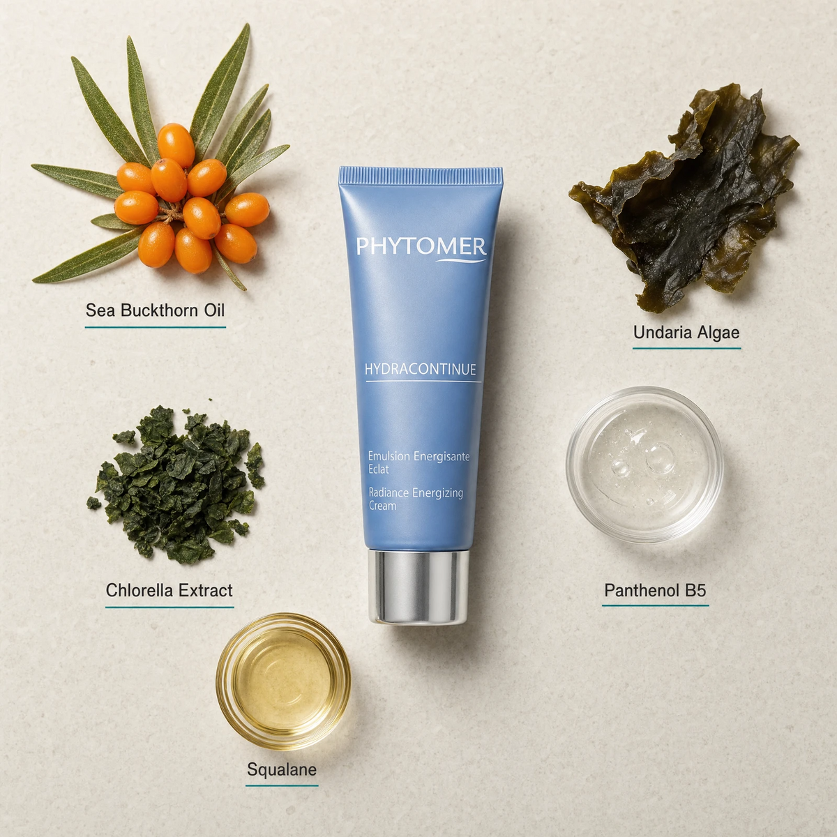 Phytomer Hydra Continue Radiance Energizing Cream 50ml flatlay on limestone surface with Sea Buckthorn Oil, Undaria Algae, Chlorella Extract, Panthenol B5, and Squalane