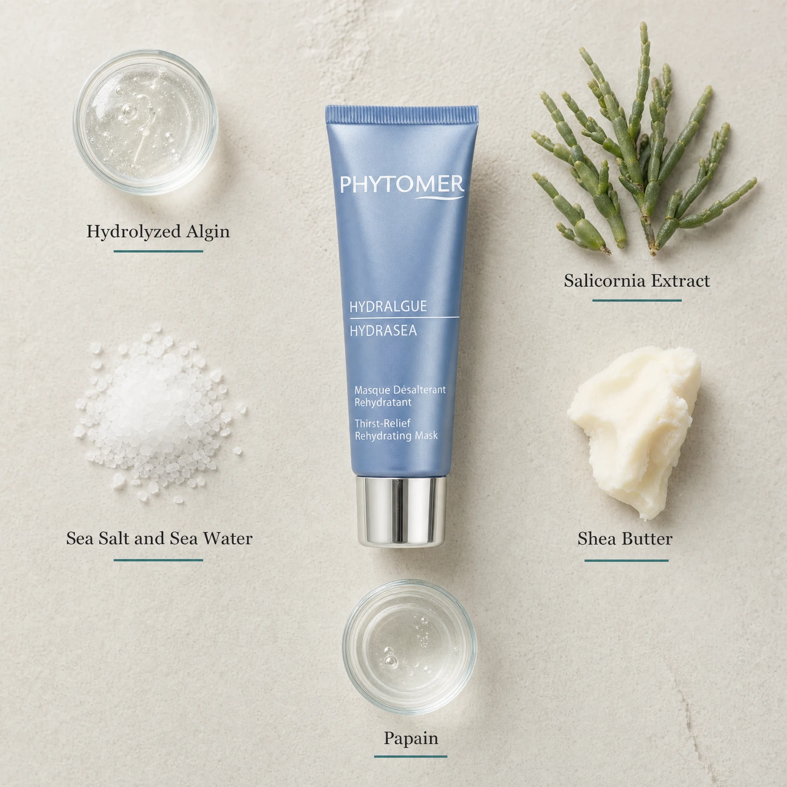 Phytomer Hydrasea Thirst-Relief Rehydrating Mask 50ml flatlay on limestone surface with Hydrolyzed Algin, Salicornia Extract, Sea Salt and Sea Water, Shea Butter, and Papain
