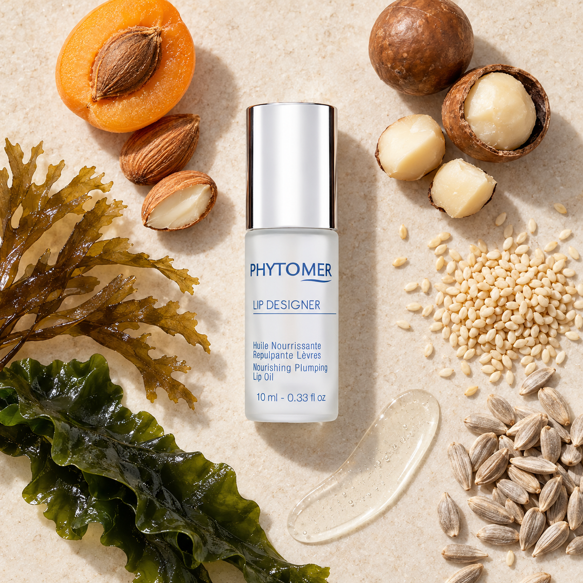PHYTOMER Lip Designer 10ml ingredient flatlay with apricot, macadamia, sesame, sunflower and marine algae