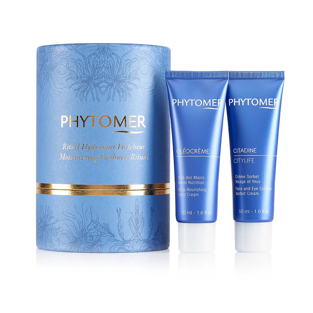 Phytomer Mother’s Day Moisturizing Freshness Ritual gift set shown open with Citylife face and eye sorbet cream and Oleocreme hand cream inside blue cylinder packaging