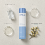 Phytomer Ogenage Toning Cleansing Emulsion 250ml flatlay on limestone surface with Sea Water Minerals, Glycerin, Isohexadecane, and Ulex Europaeus Extract