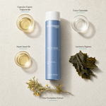 Phytomer Perfect Visage Gentle Cleansing Milk 250ml flatlay on limestone surface with Caprylic/Capric Triglyceride, Coco-Caprylate, Hazel Seed Oil, Laminaria Digitata, and Ulex Europaeus Extract