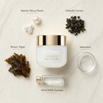 Phytomer Perles des Mers Longevity Cream 50ml prestige flatlay on warm marble with Marine Micro-Pearls, Chlorella Extract, Brown Algae, Adenosine, and OLIGOMER Seawater