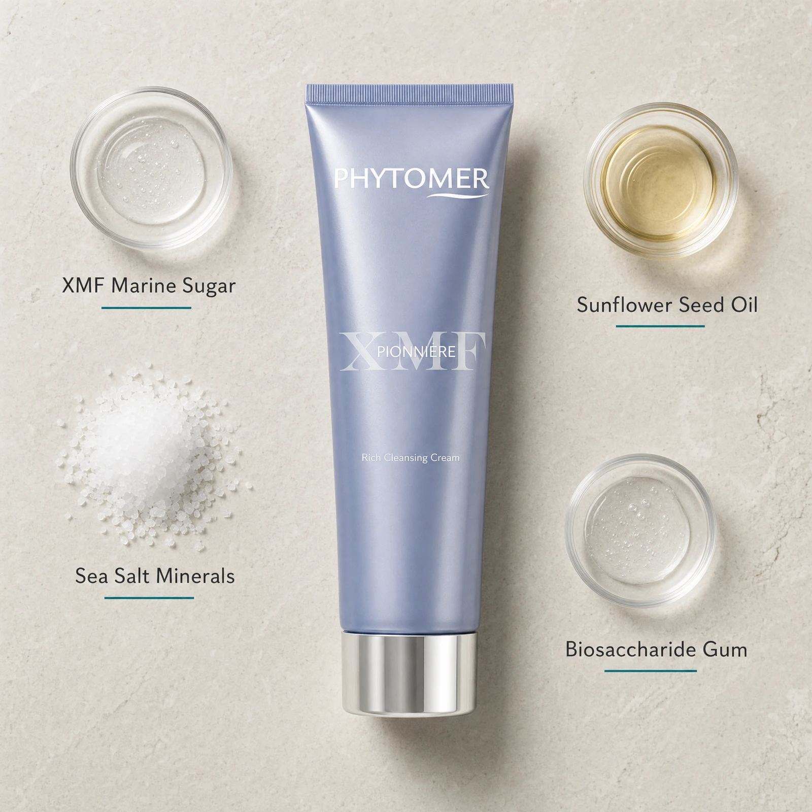 Phytomer Pionniere XMF Rich Cleansing Cream 150ml flatlay on limestone surface with XMF Marine Sugar, Sea Salt Minerals, Sunflower Seed Oil, and Biosaccharide Gum