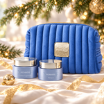 PHYTOMER Pionniere XMF Ritual Gift Set displayed beside a Christmas tree. File: phytomer-pionniere-xmf-ritual-gift-set-christmas-tree-2026.png