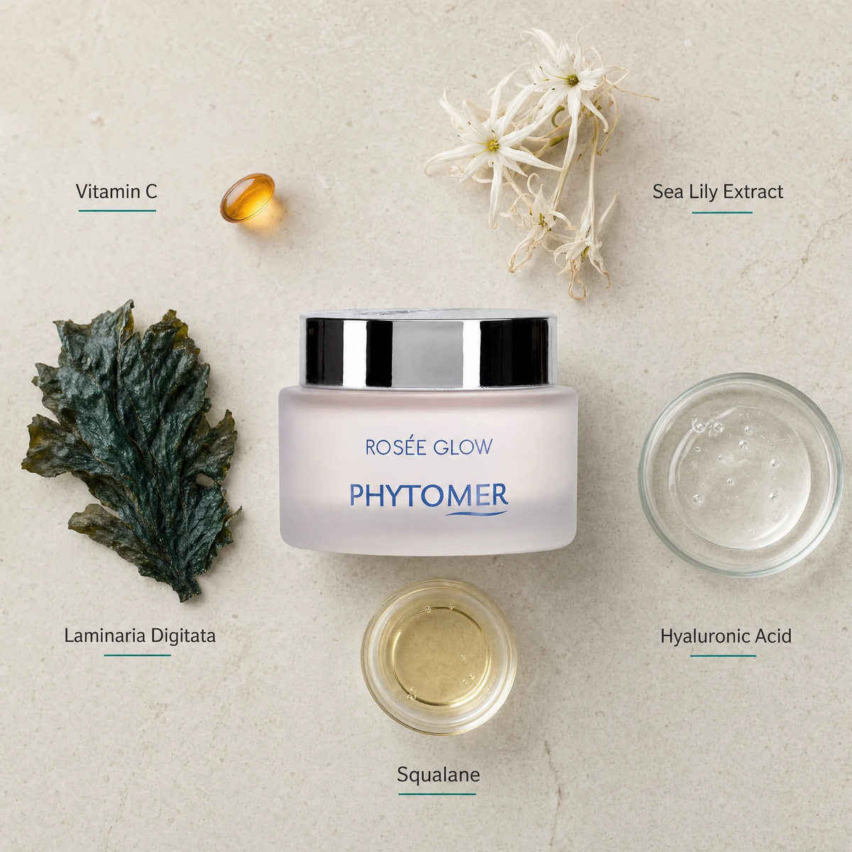Phytomer Rosée Glow Vitamin Radiance Plumping Cream flatlay on limestone surface with Vitamin C, Sea Lily Extract, Laminaria Digitata, Squalane, and Hyaluronic Acid