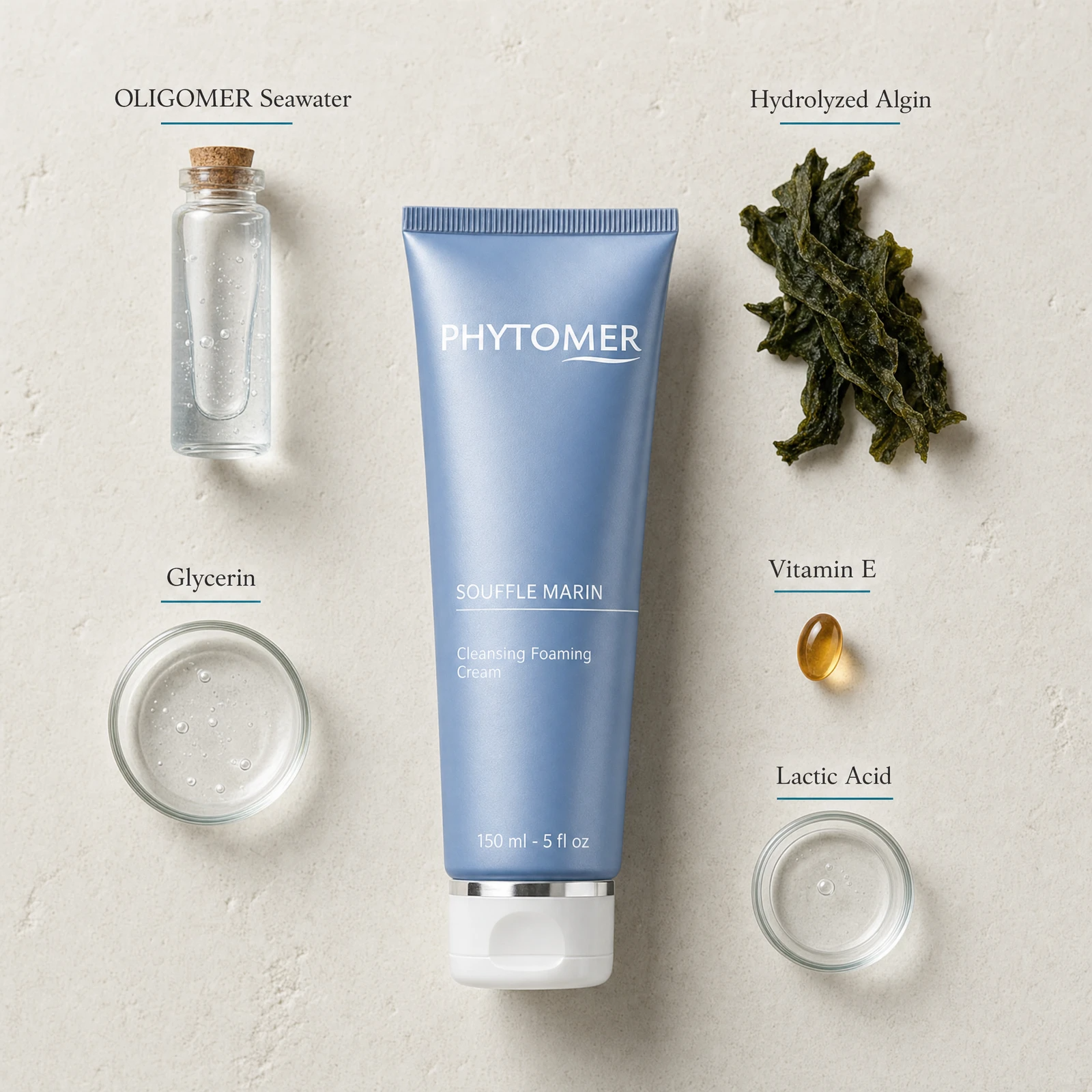 Phytomer Souffle Marin Cleansing Foaming Cream 150ml flatlay on limestone surface with OLIGOMER Seawater, Hydrolyzed Algin, Glycerin, Vitamin E, and Lactic Acid