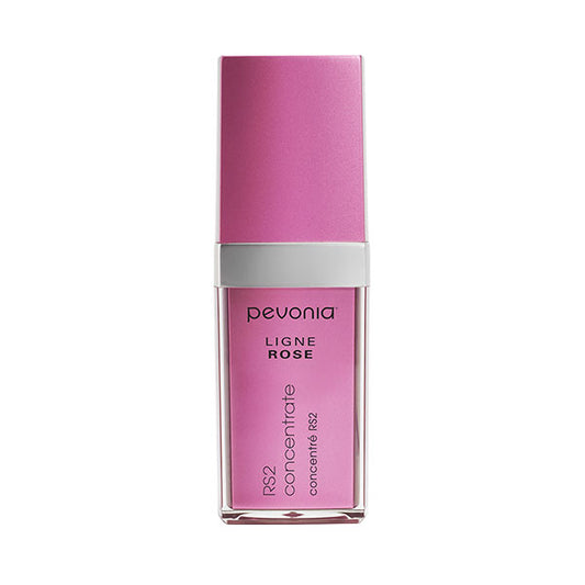 A bottle of Pevonia RS2 Rosacea Concentrate with a pink cap and label, indicating its specialized skincare use for sensitive skin conditions.
