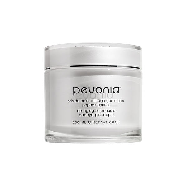 A jar of Pevonia De-Aging Saltmousse Papaya-Pineapple 200ml.