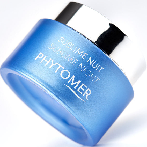 Blue jar of Phytomer sublime night skincare product on a white background