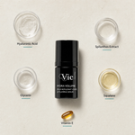 Vie Collection Hydra Volume Lip Plumping Serum 15ml flatlay on limestone surface with Hyaluronic Acid, Spilanthes Extract, Glycerin, Squalane, and Vitamin E