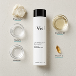 Vie Collection Instant Cleansing Milk 250ml flatlay on limestone surface with Shea Butter, Glycerin, Allantoin, Emollient Oil, and Vitamin E