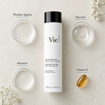 Vie Collection Micellar Water Face Eyes and Lips 250ml flatlay on limestone surface with Micellar Agents, Glycerin, Allantoin, and Vitamin E